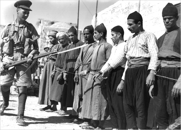 British soldiers and Palestinian prisoners during the revolt.