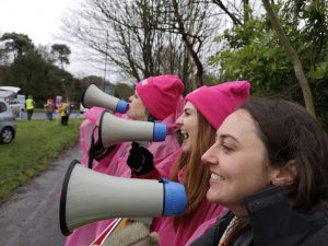 Young women with megaphones