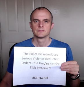 Placard reads "The Police Bill introduces Serious Violence Reduction Orders - but they're not for Elbit Systems?! #KillTheBill"