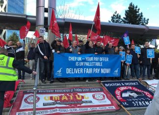 Picket line rally of CHEP strikers - banners for Greater Manchester Area Trade Union Council, Bolton and District Trades Union Council, and a CHEP banner reading 'CHEP UK your offer is un'pallet'able - deliver fair pay now!'