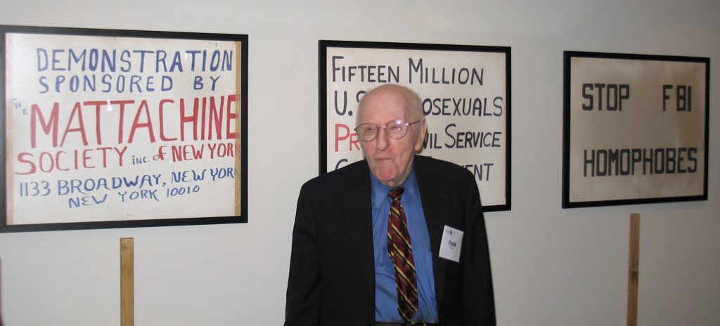 Frank Kameny in 2009 with protest placards from the 1950s