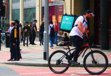 Deliveroo bike rider in Manchester