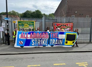 Banner reads All Aboard the Strike Train