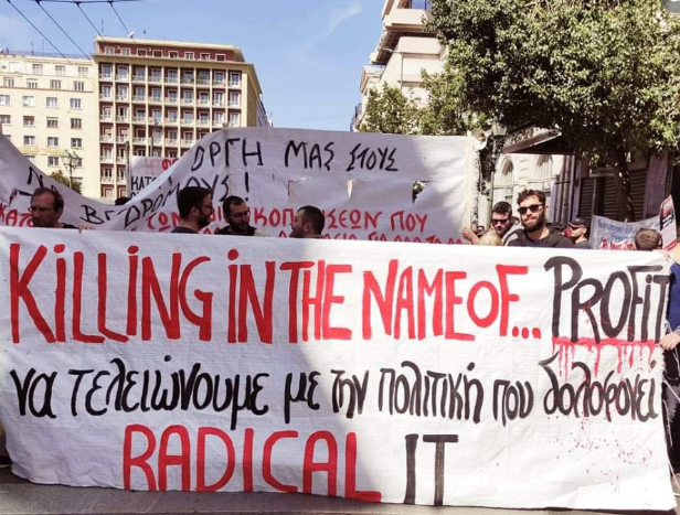 Large banner held by a row of men reads 'Killing in the name of profit - Radical IT'.
