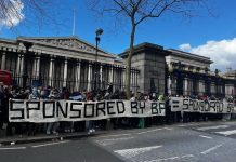 Activists holding a large banner that reads ‘sponsored by BP’ form a blockade outside the front gates of the British Museum.